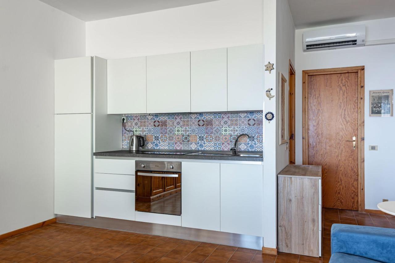 L&M Apartments - Pool - By Host4U Muscoline Bagian luar foto